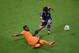 RECIFE, BRAZIL - JUNE 14: Hotaru Yamaguchi of Japan tries to clear the ball past Serge Aurier of the Ivory Coast during the 2014 FIFA World Cup Brazil Group C match between the Ivory Coast and Japan at Arena Pernambuco on June 14, 2014 in Recife, Brazil.