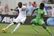 JACKSONVILLE, FL - JUNE 07: Forward Jozy Altidore #17 of the United States shoots and scores his second game of the game behind defender Joseph Yobo #2 of Nigeria during the international friendly match at EverBank Field on June 7, 2014 in Jacksonville,