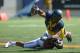 Oct 5, 2013; Berkeley, CA, USA; California Golden Bears receiver Richard Rodgers (11) is tackled by Washington State Cougars linebacker Cyrus Coen (42) at Memorial Stadium. Washington State defeated California 44-22. Mandatory Credit: Kirby Lee-USA TODAY