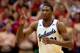 LAWRENCE, KS - JANUARY 18: Joel Embiid #21 of the Kansas Jayhawks reacts after scoring during the game against the Oklahoma State Cowboys at Allen Fieldhouse on January 18, 2014 in Lawrence, Kansas. (Photo by Jamie Squire/Getty Images)