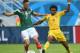 NATAL, BRAZIL - JUNE 13: Miguel Layun of Mexico battles with Cedric Djeugoue of Cameroon during the 2014 FIFA World Cup Brazil Group A match between Mexico and Cameroon at Estadio das Dunas on June 13, 2014 in Natal, Brazil. (Photo by Matthias Hangst/Ge