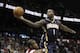 Apr 24, 2014; Atlanta, GA, USA; Indiana Pacers guard Lance Stephenson (1) shoots the ball against the Atlanta Hawks in the fourth quarter in game three of the first round of the 2014 NBA Playoffs at Philips Arena. The Hawks defeated the Pacers 98-85. Mand