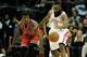 HOUSTON, TX - DECEMBER 18: James Harden #13 of the Houston Rockets drives with the ball against Jimmy Butler #21 of the Chicago Bulls during the game at Toyota Center on December 18, 2013 in Houston, Texas. NOTE TO USER: User expressly acknowledges and a
