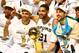SAN ANTONIO, TX - JUNE 15: Tony Parker #9 and Tim Duncan #21, and Manu Ginobili #20 of the San Antonio Spurs celebrate after defeating the Miami Heat in Game Five of the 2014 NBA Finals at the AT&T Center on June 15, 2014 in San Antonio, Texas. NOTE TO U