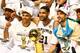 SAN ANTONIO, TX - JUNE 15: Tony Parker #9 and Tim Duncan #21, and Manu Ginobili #20 of the San Antonio Spurs celebrate after defeating the Miami Heat in Game Five of the 2014 NBA Finals at the AT&T Center on June 15, 2014 in San Antonio, Texas. NOTE TO U