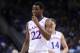 Mar 13, 2014; Kansas City, MO, USA; Kansas Jayhawks guard Andrew Wiggins (22) laughs while on the foul line during the second half against the Oklahoma State Cowboys in the second round of the Big 12 Conference college basketball tournament at Sprint Cent