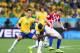 SAO PAULO, BRAZIL - JUNE 12: Hernanes and Ramires of Brazil battle with Marcelo Brozovic of Croatia for the ball during the 2014 FIFA World Cup Brazil Group A match between Brazil and Croatia at Arena de Sao Paulo on June 12, 2014 in Sao Paulo, Brazil. (
