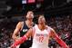 HOUSTON, TX - APRIL 14: Dwight Howard #12 of the Houston Rockets boxes out Tim Duncan #21 of the San Antonio Spurs during the game on April 14, 2014 at the Toyota Center in Houston, Texas. NOTE TO USER: User expressly acknowledges and agrees that, by down