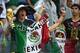 NATAL, BRAZIL - JUNE 13: Mexico fans cheer during the 2014 FIFA World Cup Brazil Group A match between Mexico and Cameroon at Estadio das Dunas on June 13, 2014 in Natal, Brazil. (Photo by Matthias Hangst/Getty Images)