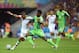 CURITIBA, BRAZIL - JUNE 16: Joseph Yobo of Nigeria challenges Ashkan Dejagah of Iran during the 2014 FIFA World Cup Brazil Group F match between Iran and Nigeria at Arena da Baixada on June 16, 2014 in Curitiba, Brazil. (Photo by Matthias Hangst/Getty I