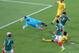 NATAL, BRAZIL - JUNE 13: Oribe Peralta of Mexico shoots and scores a goal past goalkeeper Charles Itandje of Cameroon in the second half during the 2014 FIFA World Cup Brazil Group A match between Mexico and Cameroon at Estadio das Dunas on June 13, 2014