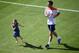 RIO DE JANEIRO, BRAZIL - JUNE 14: Robin van Persie runs with his daughter, Dina Layla van Persie during the Netherlands training session at the 2014 FIFA World Cup Brazil held at the Estadio Jose Bastos Padilha Gavea on June 14, 2014 in Rio de Janeiro, B