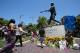 Fans pay their respects at Tony Gwynn's statue outside Petco Park.
