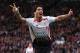 MANCHESTER, ENGLAND - MARCH 16: Luis Suarez of Liverpool celebrates scoring his team's third goal during the Barclays Premier League match between Manchester United and Liverpool at Old Trafford on March 16, 2014 in Manchester, England. (Photo by Alex L