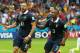 PORTO ALEGRE, BRAZIL - JUNE 15: Karim Benzema of France celebrates scoring his team's first goal on a penalty kick with Patrice Evra during the 2014 FIFA World Cup Brazil Group E match between France and Honduras at Estadio Beira-Rio on June 15, 2014 in