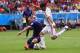 SALVADOR, BRAZIL - JUNE 13: Diego Costa of Spain and Ron Vlaar of the Netherlands battle for the ball during the 2014 FIFA World Cup Brazil Group B match between Spain and Netherlands at Arena Fonte Nova on June 13, 2014 in Salvador, Brazil. (Photo by D