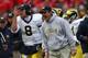 MADISON, WI - NOVEMBER 10: Head coach Lloyd Carr of the Michigan Wolverines yells at referees as Nick Sheridan #8 signals in a play to the quarterback against the Wisconsin Badgers on November 10, 2007 at Camp Randall Stadium in Madison, Wisconsin. Wiscon