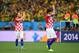 SAO PAULO, BRAZIL - JUNE 12: Ivan Rakitic (L) and Vedran Corluka of Croatia acknowledge the fans during the 2014 FIFA World Cup Brazil Group A match between Brazil and Croatia at Arena de Sao Paulo on June 12, 2014 in Sao Paulo, Brazil. (Photo by Christo