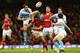 CARDIFF, WALES - NOVEMBER 10: Joaquin Tuculet (L) of Argentina spills a high ball under pressure from James Hook (C) of Wales during the Wales versus Argentina International match at the Millennium Stadium on November 10, 2012 in Cardiff, Wales. (Photo b