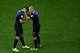 SALVADOR, BRAZIL - JUNE 13: Robin van Persie of the Netherlands (L) passes off the captain's armband to Arjen Robben as he leaves the game during the 2014 FIFA World Cup Brazil Group B match between Spain and Netherlands at Arena Fonte Nova on June 13, 2