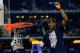 ARLINGTON, TX - APRIL 07: DeAndre Daniels #2 of the Connecticut Huskies cuts the net after defeating the Kentucky Wildcats 60-54 in the NCAA Men's Final Four Championship at AT&T Stadium on April 7, 2014 in Arlington, Texas. (Photo by Jamie Squire/Getty