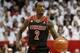 Feb 22, 2014; Cincinnati, OH, USA; Louisville Cardinals guard Russ Smith (2) brings the ball down court in the second half against the Cincinnati Bearcats at FifthThird Arena. Louisville defeated Cincinnati 58-57. Mandatory Credit: Frank Victores-USA TOD