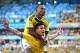 BELO HORIZONTE, BRAZIL - JUNE 14: James Rodriguez of Colombia celebrates scoring his team's third goal with Juan Camilo Zuniga during the 2014 FIFA World Cup Brazil Group C match between Colombia and Greece at Estadio Mineirao on June 14, 2014 in Belo Ho