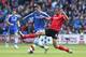 CARDIFF, WALES - MAY 11: Fernando Torres of Chelsea is challenged by Steven Caulker (R) during the Barclays Premier League match between Cardiff City and Chelsea at the Cardiff City Stadium on May 11, 2014 in Cardiff, Wales. (Photo by David Rogers/Getty