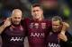 SYDNEY, AUSTRALIA - JUNE 18: Brent Tate of the Maroons is helped off the field after an injury during game two of the State of Origin series between the New South Wales Blues and the Queensland Maroons at ANZ Stadium on June 18, 2014 in Sydney, Australia