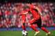 LIVERPOOL, ENGLAND - MAY 11: Luis Suarez of Liverpool in action during the Barclays Premier League match between Liverpool and Newcastle United at Anfield on May 11, 2014 in Liverpool, England. (Photo by Laurence Griffiths/Getty Images)