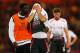 LONDON, ENGLAND - MAY 05: Kolo Toure of Liverpool consoles the dejected Luis Suarez of Liverpool following their team's 3-3 draw during the Barclays Premier League match between Crystal Palace and Liverpool at Selhurst Park on May 5, 2014 in London, Engl