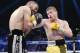 LAS VEGAS, NV - MARCH 8: Canelo Alvarez throws a punch against Alfredo Angulo (L) during the non-title, 12-round super welterweight bout at the MGM Grand Garden March 8, 2014, in Las Vegas, Nevada. Alvarez won by technical knock out after the referee stop
