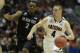 Mar 27, 2014; Anaheim, CA, USA; Arizona Wildcats guard T.J. McConnell (4) dribbles against San Diego State Aztecs guard Xavier Thames (2) during the second half in the semifinals of the west regional of the 2014 NCAA Mens Basketball Championship tournamen
