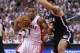 TORONTO, ON - APRIL 22: Kyle Lowry #7 of the Toronto Raptors drives for the net against the Brooklyn Nets in Game Two of the NBA Eastern Conference Quarterfinals at the Air Canada Centre on April 22, 2014 in Toronto, Ontario, Canada. The Raptors defeated