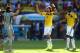 BELO HORIZONTE, BRAZIL - JUNE 14: (L-R) David Ospina, Mario Yepes and Cristian Zapata of Colombia celebrate after defeating Greece 3-0 during the 2014 FIFA World Cup Brazil Group C match between Colombia and Greece at Estadio Mineirao on June 14, 2014 in