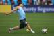 SAO PAULO, BRAZIL - JUNE 18: Luis Suarez of Uruguay in action during a Uruguay training session ahead of the 2014 FIFA World Cup Brazil match against England at Arena de Sao Paulo on June 18, 2014 in Sao Paulo, Brazil. (Photo by Richard Heathcote/Getty