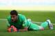 BELO HORIZONTE, BRAZIL - JUNE 14: Orestis Karnezis of Greece lies on the field after allowing a third goal to Colombia during the 2014 FIFA World Cup Brazil Group C match between Colombia and Greece at Estadio Mineirao on June 14, 2014 in Belo Horizonte,
