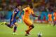 RECIFE, BRAZIL - JUNE 14: Yaya Toure of the Ivory Coast controls the ball against Hotaru Yamaguchi of Japan during the 2014 FIFA World Cup Brazil Group C match between the Ivory Coast and Japan at Arena Pernambuco on June 14, 2014 in Recife, Brazil. (Ph