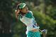 PINEHURST, NC - JUNE 17: Eleven-year old Amateur Lucy Li of the United States hits a shot during a practice round prior to the start of the 69th U.S. Women's Open at Pinehurst Resort & Country Club, Course No. 2 on June 17, 2014 in Pinehurst, North Carol