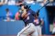 TORONTO, CANADA - JUNE 9: Brian Dozier #2 of the Minnesota Twins hits a solo home run in the first inning during MLB game action against the Toronto Blue Jays on June 9, 2014 at Rogers Centre in Toronto, Ontario, Canada. (Photo by Tom Szczerbowski/Getty I