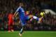 LONDON, ENGLAND - DECEMBER 29: Ashley Cole of Chelsea controls the ball during the Barclays Premier League match between Chelsea and Liverpool at Stamford Bridge on December 29, 2013 in London, England. (Photo by Julian Finney/Getty Images)