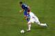 MANAUS, BRAZIL - JUNE 14: Adam Lallana of England controls the ball as Claudio Marchisio of Italy gives chase during the 2014 FIFA World Cup Brazil Group D match between England and Italy at Arena Amazonia on June 14, 2014 in Manaus, Brazil. (Photo by W