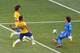 FORTALEZA, BRAZIL - JUNE 17: Paulinho of Brazil shoots against Guillermo Ochoa of Mexico as David Luiz runs on during the 2014 FIFA World Cup Brazil Group A match between Brazil and Mexico at Castelao on June 17, 2014 in Fortaleza, Brazil. (Photo by Jam