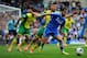 LONDON, ENGLAND - MAY 04: Eden Hazard of Chelsea holds off the challenge of Robert Snodgrass of Norwich City during the Barclays Premier League match between Chelsea and Norwich City at Stamford Bridge on May 4, 2014 in London, England. (Photo by Michae