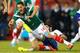 FOXBORO, MA - JUNE 06: Javier Hernandez #14 of Mexico is fouled by Neto #14 of Portugal in the second half during the international friendly match at Gillette Stadium on June 6, 2014 in Foxboro, Massachusetts. (Photo by Jared Wickerham/Getty Images)