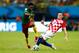 MANAUS, BRAZIL - JUNE 18: Ivica Olic of Croatia and Benjamin Moukandjo of Cameroon compete for the ball during the 2014 FIFA World Cup Brazil Group A match between Cameroon and Croatia at Arena Amazonia on June 18, 2014 in Manaus, Brazil. (Photo by Phil