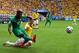 BRASILIA, BRAZIL - JUNE 19: Serge Aurier of the Ivory Coast dribbles past Santiago Arias of Colombia during the 2014 FIFA World Cup Brazil Group C match between Colombia and Cote D'Ivoire at Estadio Nacional on June 19, 2014 in Brasilia, Brazil. (Photo