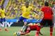 Jun 17, 2014; Fortaleza, Ceara, BRAZIL; Brazil forward Neymar (10) gets past Mexico forward Giovani Dos Santos (10) during the first half of the 2014 World Cup game at Estadio Castelao. Mandatory Credit: Winslow Townson-USA TODAY Sports