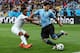 SAO PAULO, BRAZIL - JUNE 19: Raheem Sterling of England and Luis Suarez of Uruguay compete for the ball during the 2014 FIFA World Cup Brazil Group D match between Uruguay and England at Arena de Sao Paulo on June 19, 2014 in Sao Paulo, Brazil. (Photo b
