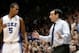 Jan 25, 2014; Durham, NC, USA; Duke Blue Devils head coach Mike Krzyzewski talks to Duke Blue Devils forward Rodney Hood (5) on the sidelines against the Florida State Seminoles at Cameron Indoor Stadium. Mandatory Credit: Mark Dolejs-USA TODAY Sports